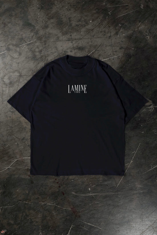 Black t-shirt with 'LAMINE' logo on a dark textured surface