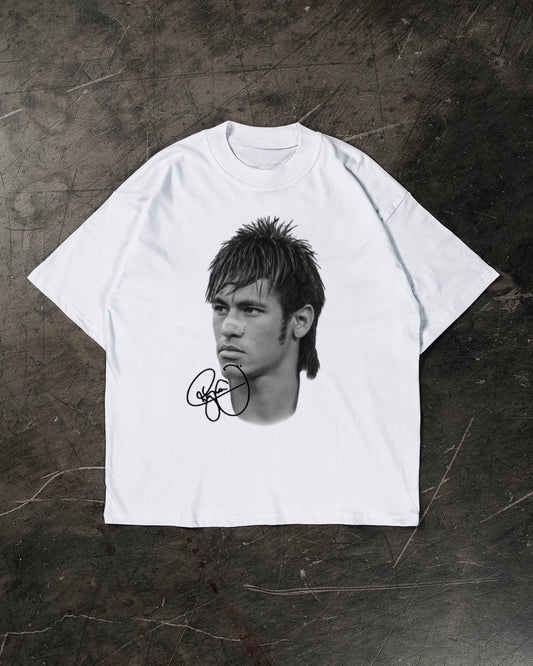 White t-shirt with a graphic of a Neymar Jr and signature on a dark textured surface