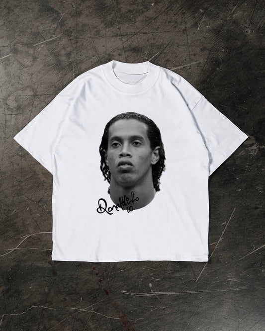 White t-shirt with a Ronaldinho on a textured dark surface